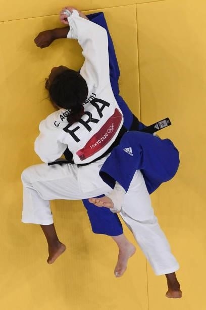 France's Clarisse Agbegnenou and Slovenia's Tina Trstenjak compete in the judo women's -63kg gold medal bout during the Tokyo 2020 Olympic Games at...