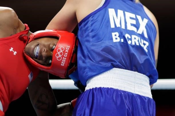 S Oshae Lanae Jones and Mexico's Brianda Tamara Cruz Sandoval fight during their women's welter preliminaries round of 16 boxing match during the...