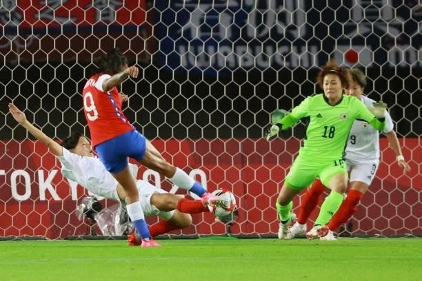 Chile's forward Maria Jose Urrutia shoots and fails to score during the Tokyo 2020 Olympic Games women's group E first round football match between...