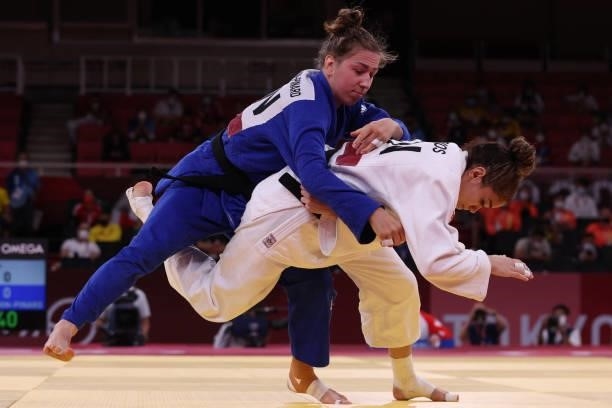 Venezuela's Anriquelis Barrios and Canada's Catherine Beauchemin-Pinard compete in the judo women's -63kg bronze medal B bout during the Tokyo 2020...