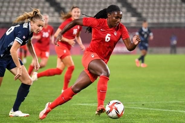 Canada's forward Deanne Rose controls the ball during the Tokyo 2020 Olympic Games women's group E first round football match between Canada and...