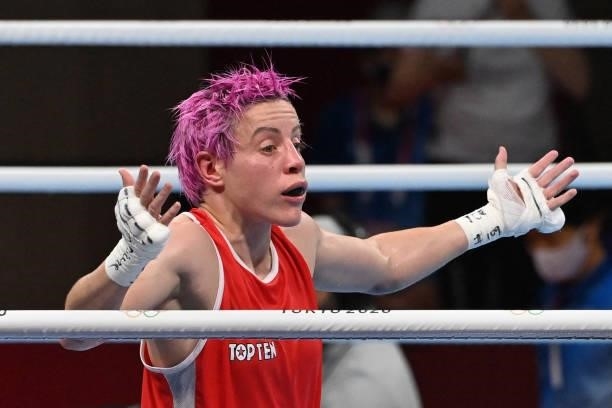 France's Maiva Hamadouche reacts after losing against Finland's Mira Marjut Johanna Potkonen at the end of their women's light preliminaries boxing...