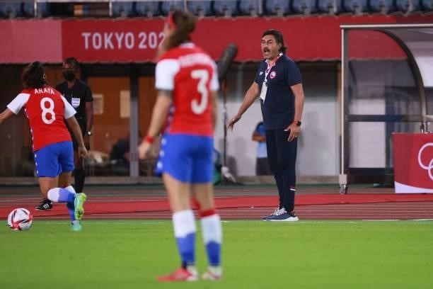 Chile's coach Jose Letelier shots instructions to players from the touchline during the Tokyo 2020 Olympic Games women's group E first round football...
