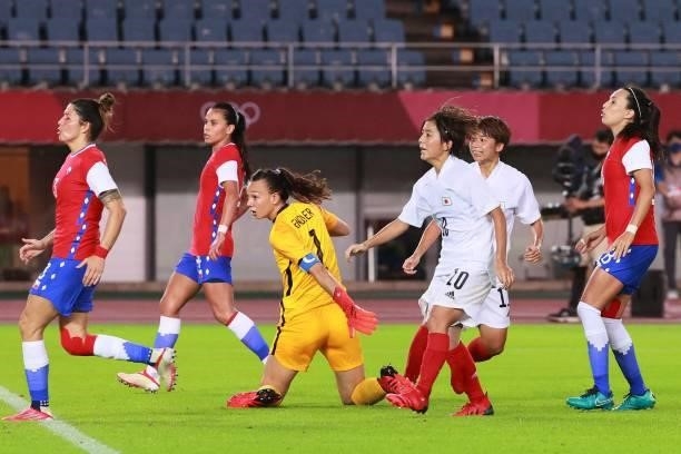 Japan's forward Mina Tanaka reacts after scoring a goal during the Tokyo 2020 Olympic Games women's group E first round football match between Chile...