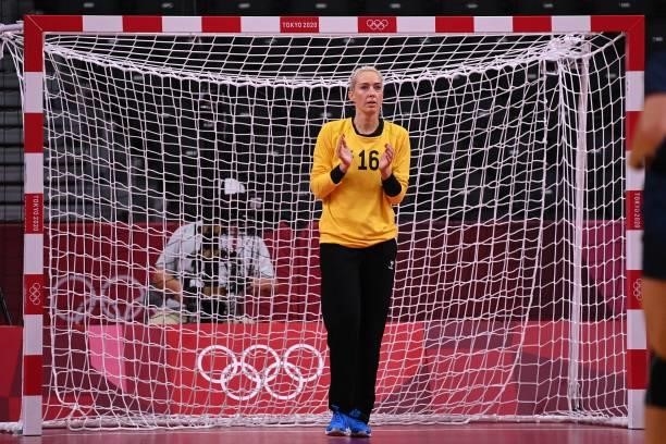 Norway's goalkeeper Katrine Lunde applauds during the women's preliminary round group A handball match between Angola and Norway of the Tokyo 2020...