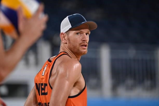 Netherlands' Alexander Brouwer waits for the serve in their men's preliminary beach volleyball pool D match between the Netherlands and Argentina...