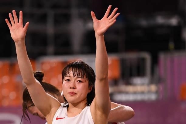 Japan's Mai Yamamoto reacts at the end of the women's quarter final 3x3 basketball match between Japan and France at the Aomi Urban Sports Park in...