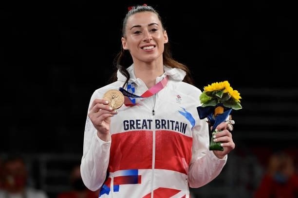 Bronze medalist Britain's Bianca Walkden poses on the podium after the taekwondo women's +67kg bronze medal A bout during the Tokyo 2020 Olympic...