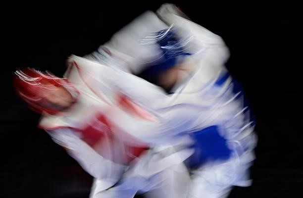 Russia's Vladislav Larin and North Macedonia's Dejan Georgievski compete in the taekwondo men's +80kg gold medal bout during the Tokyo 2020 Olympic...