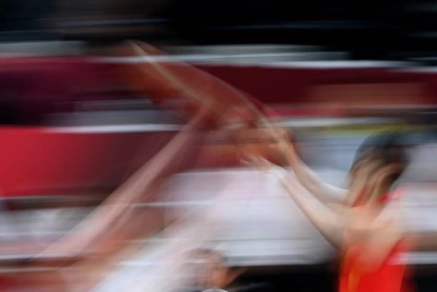 China's Li Yuan throws the ball in the women's preliminary round group C basketball match between China and Puerto Rico during the Tokyo 2020 Olympic...