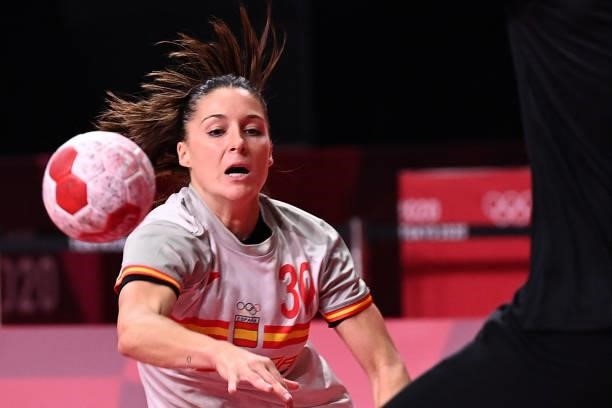 Spain's left wing Soledad Lopez Jimenez shoots during the women's preliminary round group B handball match between France and Spain of the Tokyo 2020...