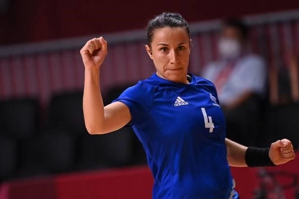 France's right wing Pauline Coatanea celebrates after scoring during the women's preliminary round group B handball match between France and Spain of...
