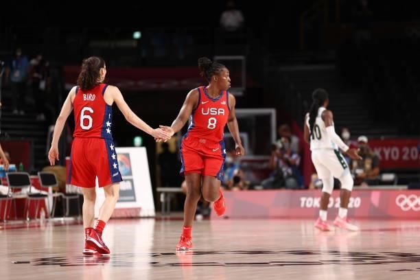 Sue Bird of the USA Basketball Womens National Team high fives teammate Chelsea Gray during the game against the Nigeria Women's National Team during...