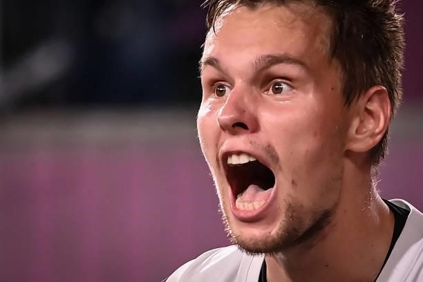 Russia's Alexander Zuev celebrates after wining at the end of the men's quarter final 3x3 basketball match between Netherlands and Russia at the Aomi...