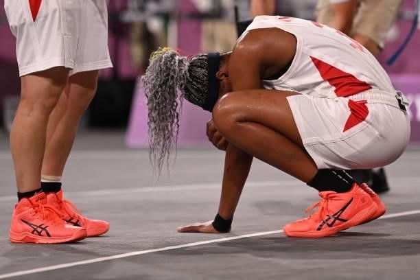 Japan's Stephanie Mawuli reacts at the end of the women's quarter final 3x3 basketball match between Japan and France at the Aomi Urban Sports Park...