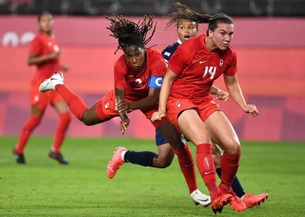 Canada's defender Kadeisha Buchanan and Canada's defender Vanessa Gilles during the Tokyo 2020 Olympic Games women's group E first round football...