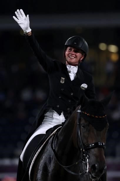 Germany's Jessica von Bredow-Werndl riding TSF Dalera celebrates after winning the gold medal in the dressage grand prix special team competition...