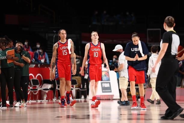 Brittney Griner of the USA Basketball Womens National Team and teammates Breanna Stewart and Diana Taurasi walk down the court after the game against...
