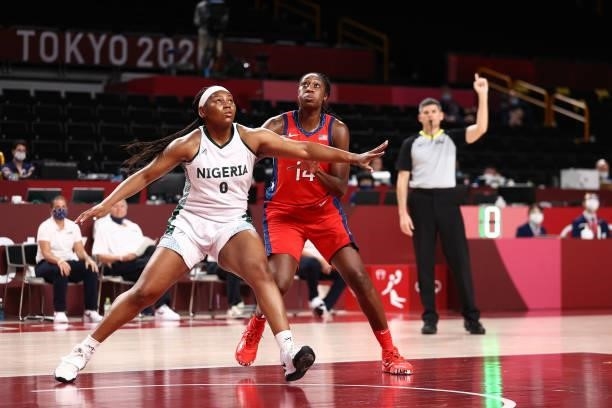 Amy Okonkwo of the Nigeria Womens National Team and Tina Charles of the USA Basketball Womens National Team look up for the rebound during the 2020...