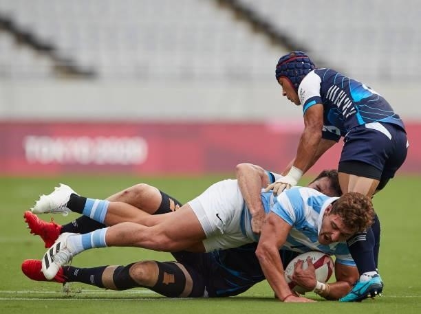 Rodrigo Isgro of Argentina and Andre Jin Coquillard of South Korea battle for the ball during the Rugby Pool A match between Argentina and Republic...