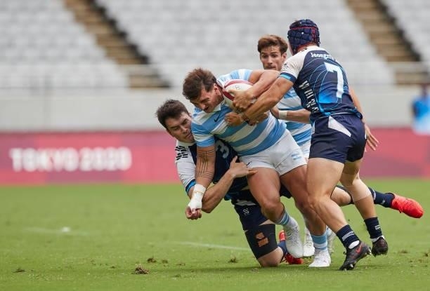 Andre Jin Coquillard of South Korea, Rodrigo Isgro of Argentina and Jeongmin Jang of South Korea battle for the ball during the Rugby Pool A match...