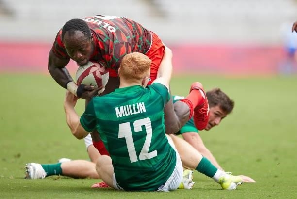 Jeff Oluoch of Kenya and Gavin Mullin of Ireland battle for the ball during the Rugby Pool c match between Kenya and Ireland on day four of the Tokyo...