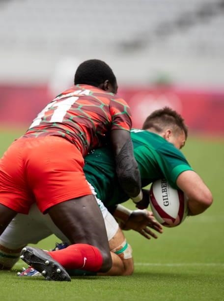 Collins INJERA of Kenya and Harry McNulty of Ireland battle for the ball during the Rugby Pool c match between Kenya and Ireland on day four of the...
