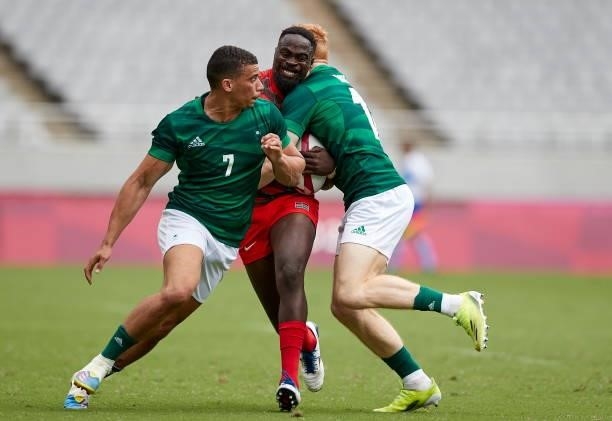 Player of Kenya and Players of Ireland battle for the ball during the Rugby Pool c match between Kenya and Ireland on day four of the Tokyo 2020...