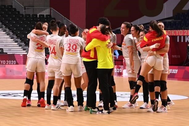 Spain's players celebrate their victory after the women's preliminary round group B handball match between France and Spain of the Tokyo 2020 Olympic...