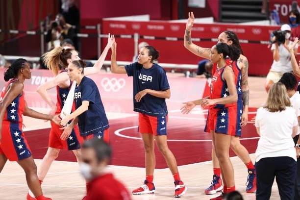 The USA Basketball Womens National Team high five during the game against the Nigeria Women's National Team during the 2020 Tokyo Olympics at the...