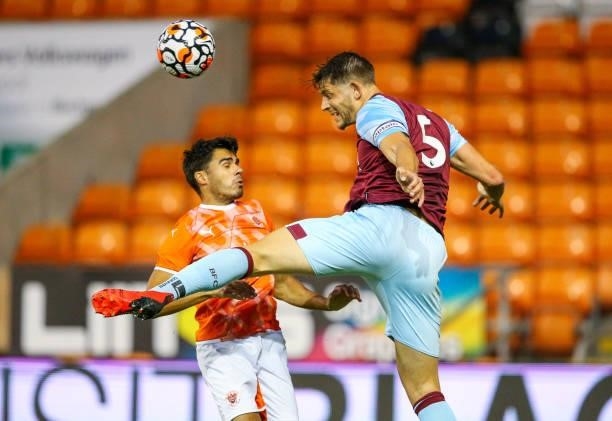 Burnley's James Tarkowski battles with Blackpool's Reece James during the Pre-Season Friendly match between Blackpool and Burnley at Bloomfield Road...