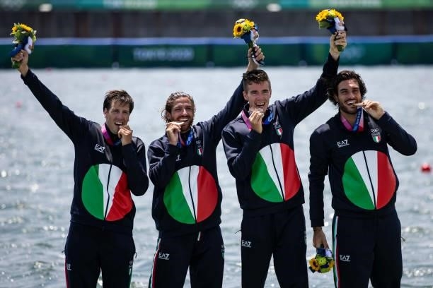 Matteo Castaldo of Italy, Bruno Rosetti of Italy, Matteo Lodo of Italy and Giuseppe Vicino of Italy lie in the water during the men's semi-final in...