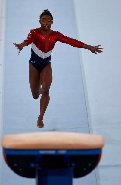 Simone Biles of USA compete during the women's team final on the jumping table during Artistic Gymnastics on day four of the Tokyo 2020 Olympic Games...