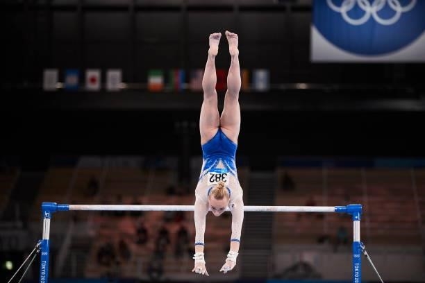 Angela Melnikova of Russian Olympic Commite compete during the women's team final on the uneven bars during Artistic Gymnastics on day four of the...