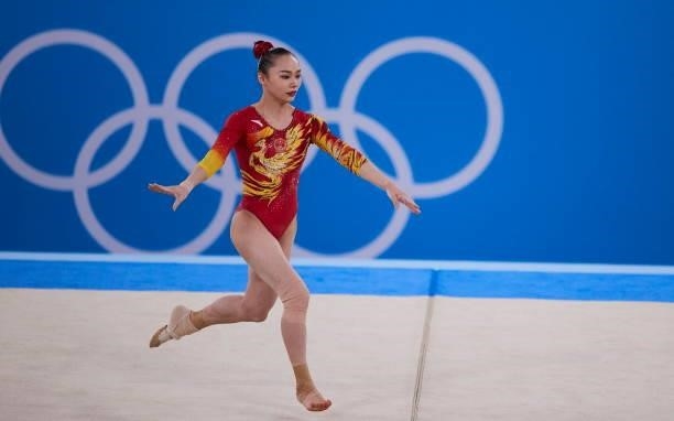 Xijing Tang of China compete during the women's floor exercise team final during Artistic Gymnastics on day four of the Tokyo 2020 Olympic Games at...