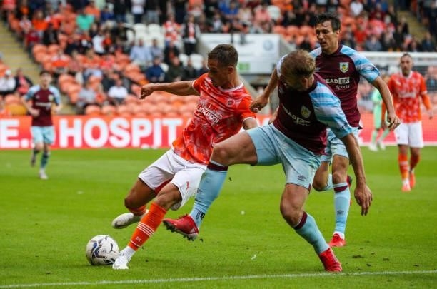 Blackpool's Jerry Yates holds off the challenge from Burnley's Charlie Taylor during the Pre-Season Friendly match between Blackpool and Burnley at...