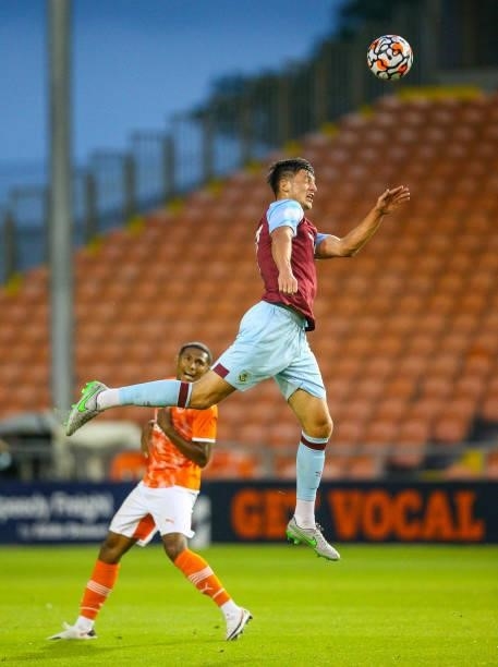 Burnley's Bobby Thomas wins a header during the Pre-Season Friendly match between Blackpool and Burnley at Bloomfield Road on July 27, 2021 in...