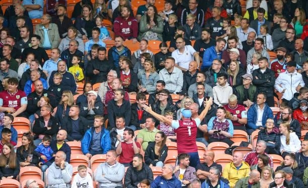 Burnley fans watch on during the Pre-Season Friendly match between Blackpool and Burnley at Bloomfield Road on July 27, 2021 in Blackpool, England.