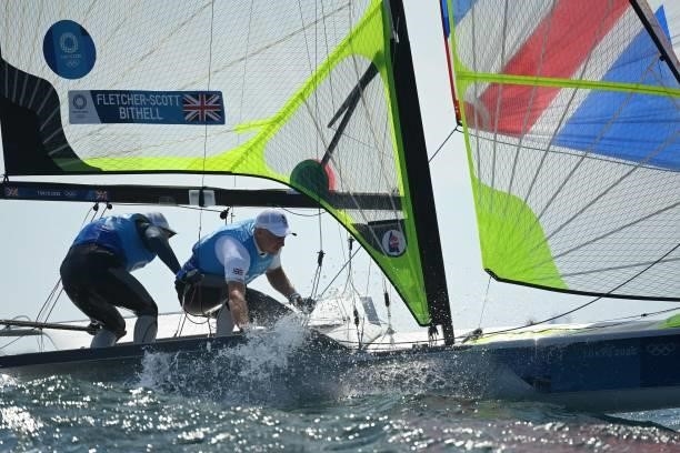 Britain's Stuart Bithell and Dylan Fletcher-Scott compete in the men's skiff 49er race during the Tokyo 2020 Olympic Games sailing competition at the...