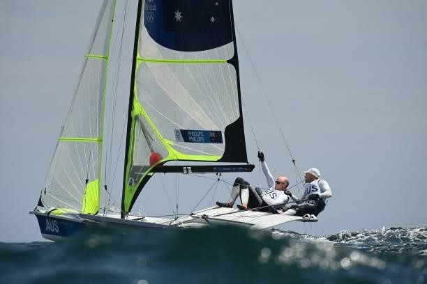 Australia's Sam Phillips and William Phillips compete in the men's skiff 49er race during the Tokyo 2020 Olympic Games sailing competition at the...