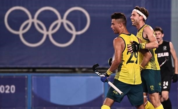 Australia's Tim Brand celebrates after scoring against New Zealand during their men's pool A match of the Tokyo 2020 Olympic Games field hockey...