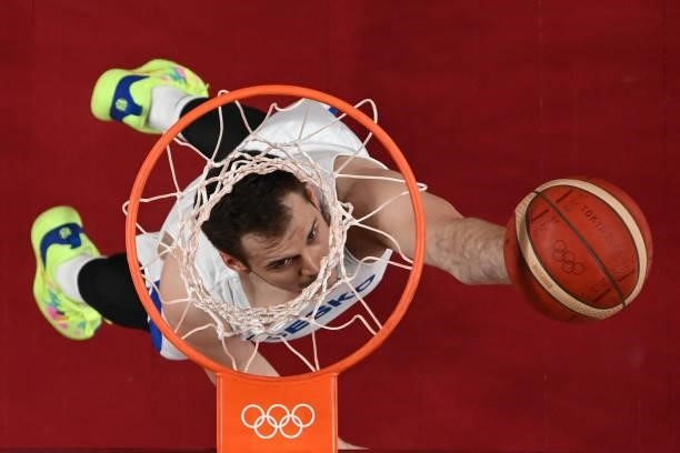 Czech Republic's Jaromir Bohacik goes to the basket in the men's preliminary round group A basketball match between France and Czech Republic during...