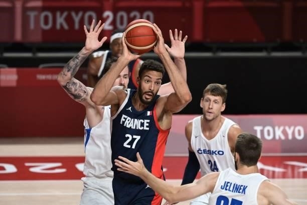 France's Rudy Gobert defends the ball from Czech Republic's Ondrej Balvin and Jan Vesely in the men's preliminary round group A basketball match...