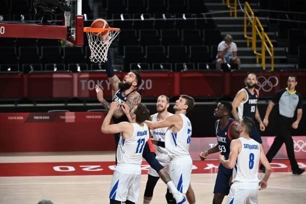 France's Vincent Poirier goes to the basket past Czech Republic's Jaromir Bohacik in the men's preliminary round group A basketball match between...