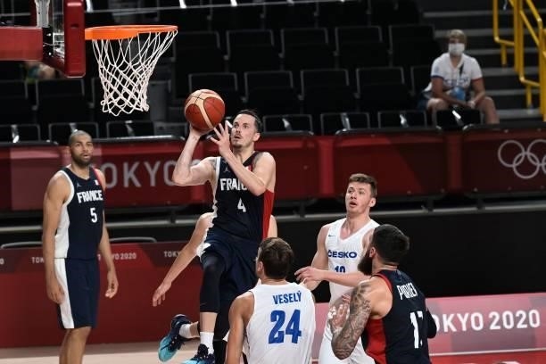 France's Thomas Heurtel goes to the basket past Czech Republic's Jan Vesely in the men's preliminary round group A basketball match between France...