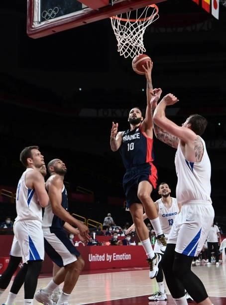 France's Evan Fournier goes to the basket past Czech Republic's Ondrej Balvin during the men's preliminary round group A basketball match between...