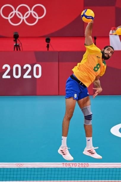 Brazil's Wallace de Souza serves in the men's preliminary round pool B volleyball match between Brazil and Russia during the Tokyo 2020 Olympic Games...
