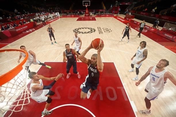 France's Nicolas Batum goes to the basket in the men's preliminary round group A basketball match between France and Czech Republic during the Tokyo...