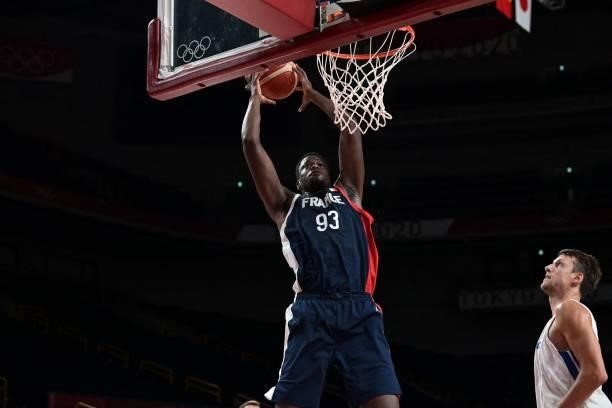 France's Moustapha Fall goes for a dunk during the men's preliminary round group A basketball match between France and Czech Republic of the Tokyo...