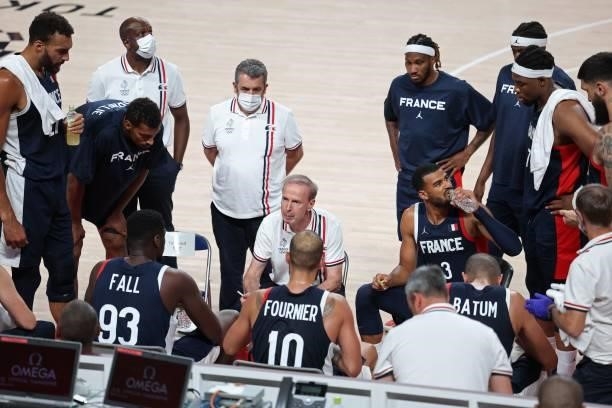 France's team coach Vincent Collet speaks to his players in the men's preliminary round group A basketball match between France and Czech Republic...